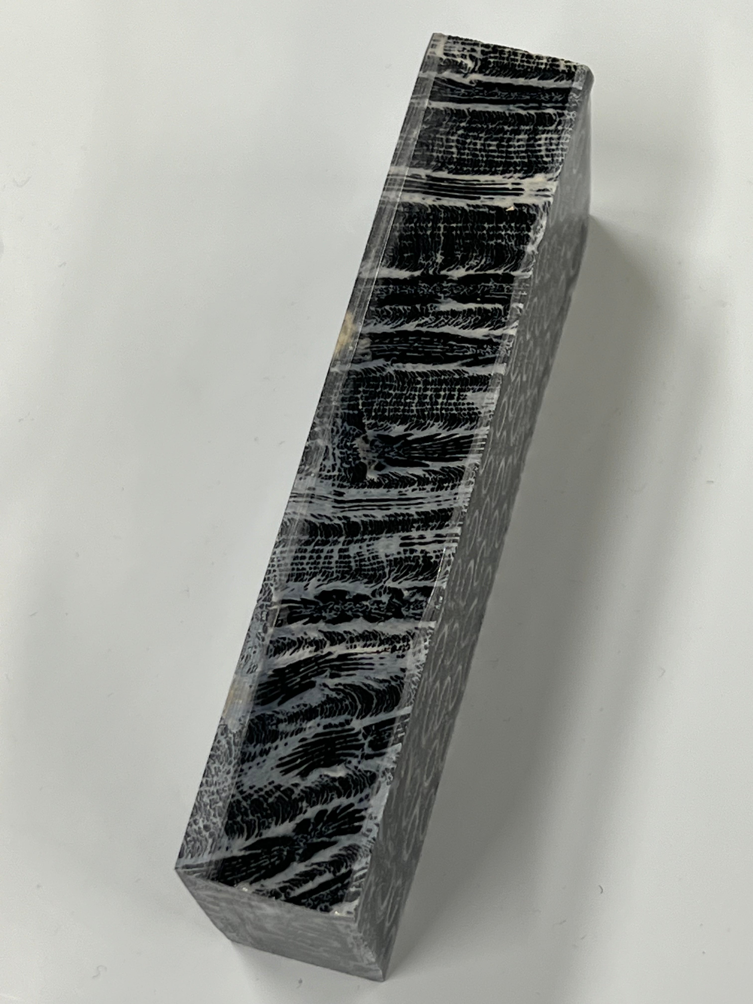 Pezzo grezzo per manico in corallo fossile K4 (nero)